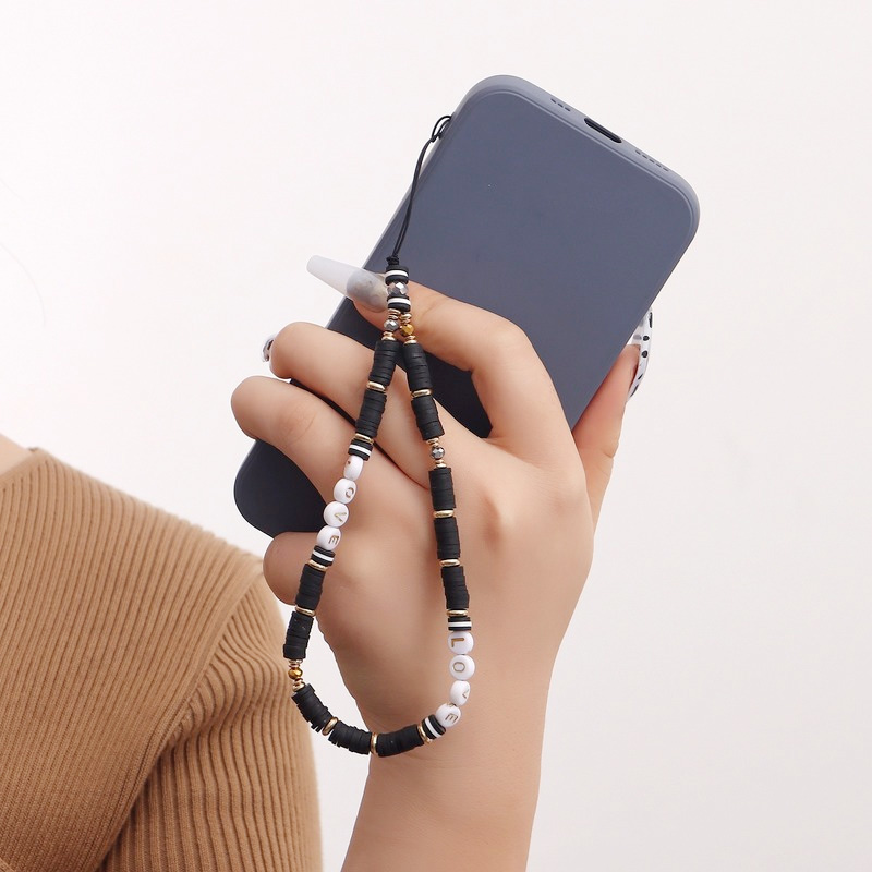 Women Accessories Picture - Aksesoris Gantungan Ponsel Fashion Devil's Eye